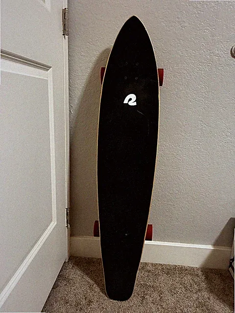 Retrospec Longboard, 70mm wheels, lightly used, good condition, pink accents